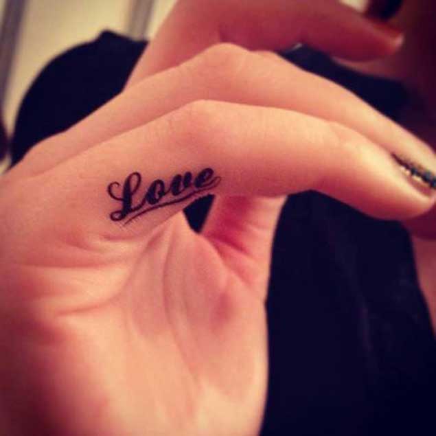 Love Tattoo On Side Finger For Girls