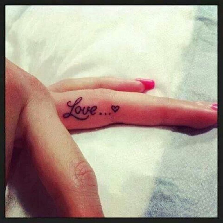 Love Word And Heart Tattoo On Finger For Girls