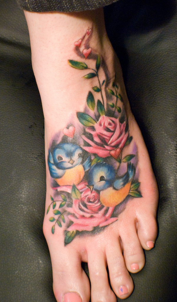 Lovely Birds And Roses Tattoo On Foot For Girls