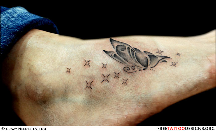 Lovely Black Butterfly Stars Tattoo On Foot