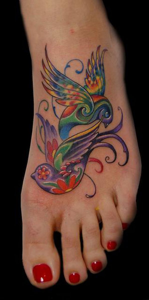 Lovely Colorful Birds Tattoo On Girl Foot