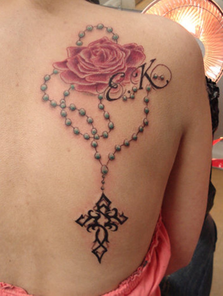 Lovely Rose And Rosary Tattoo On Upper Back For Girls