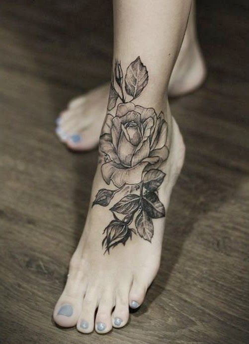 Lovely Rose Flower Black And White Tattoo On Foot