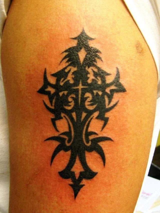Lovely Tribal Christian Cross Tattoo On Left Shoulder