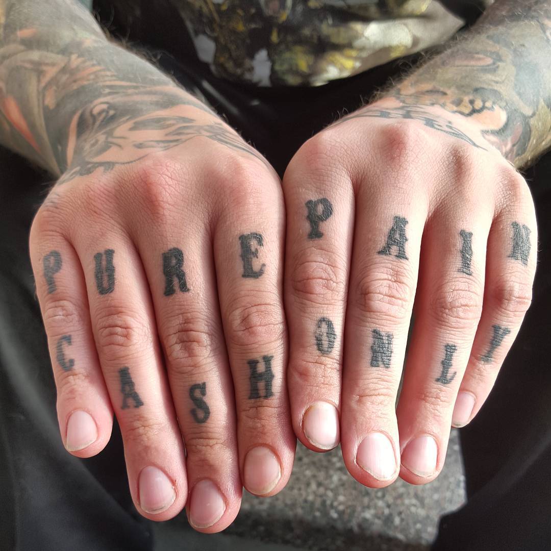 Man Knuckle Wording Tattoo