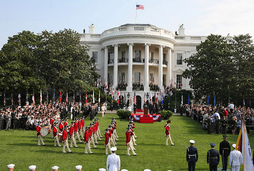 Marches Across The South Lawn Of White House During The Official Arrival Ceremony For Prime Minister Junichiro Koizumi Of Japan