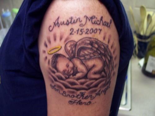 Memorial Baby Angel Tattoo On Left Shoulder
