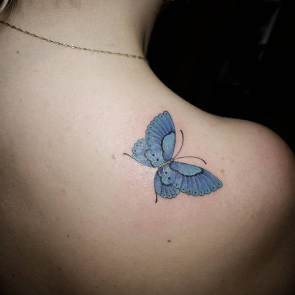 Nice Blue Butterfly Tattoo On Upper Back