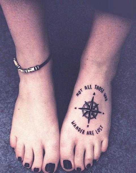 Nice Compass Quote Tattoo On Girl Foot