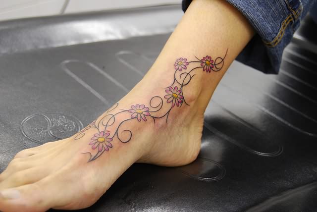Nice Flower Vine Tattoo On Foot