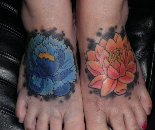 Nice Flowers Tattoos On Both Foots