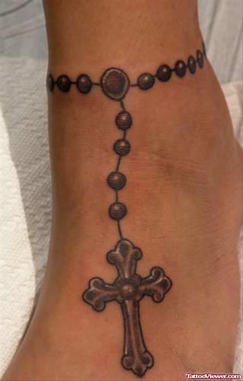 Nice Grey Ink Cross Rosary Foot Tattoo