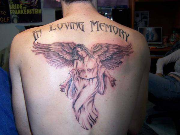 Nice In Loving Memory Angel Tattoo On Back