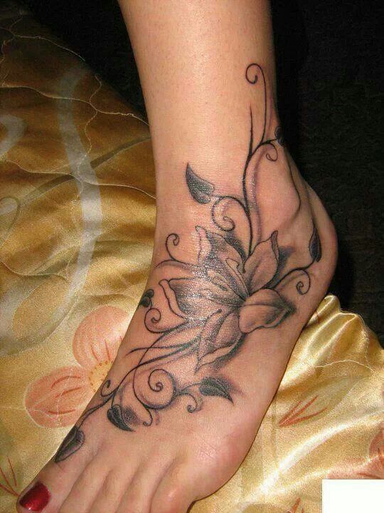 Nice Lily Flower Vine Foot Tattoo For Girls