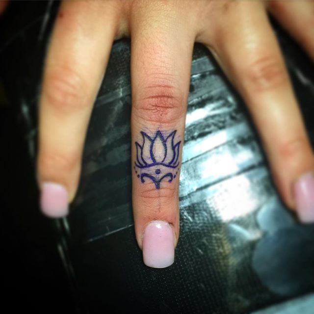 Nice Lotus Flower Tattoo On Girl Finger