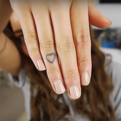 Nice Outline Finger Heart Tattoo For Girls