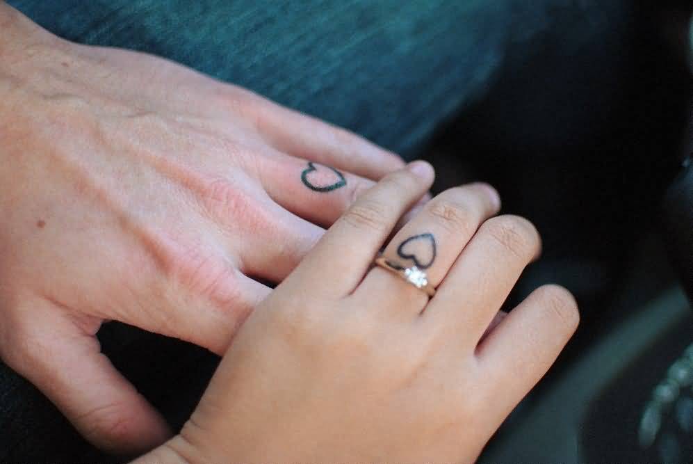 Nice Outline Heart Finger Tattoos For Couple.