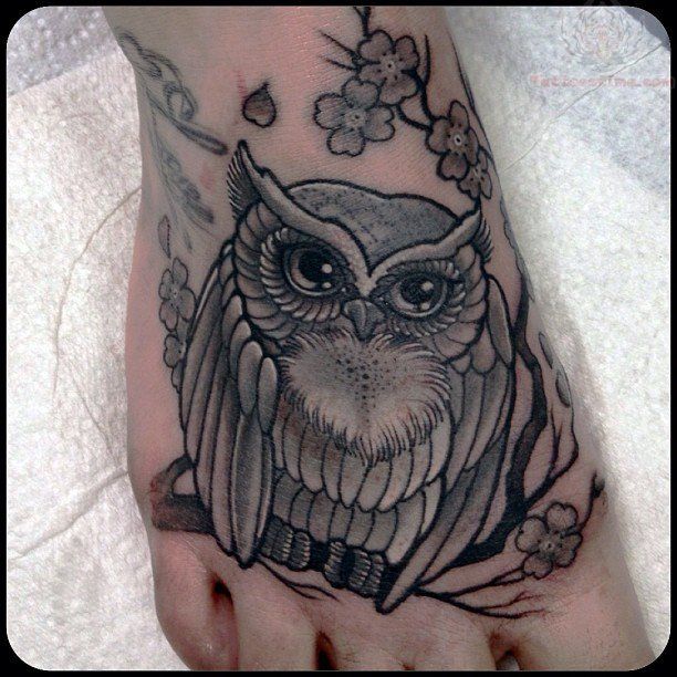 Nice Owl With Flowers Tattoo On Foot