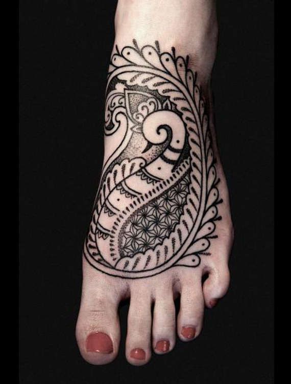 Nice Paisley Tattoo On Girl Foot