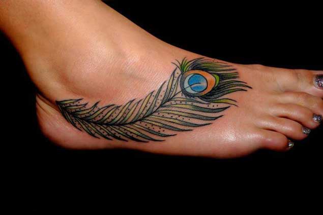 Nice Peacock Feather Foot Tattoo For Girls