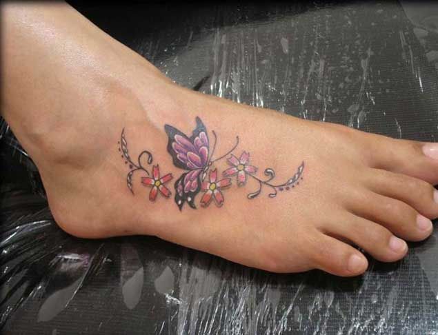 Nice Purple And Black Floral Butterfly Tattoo On Foot