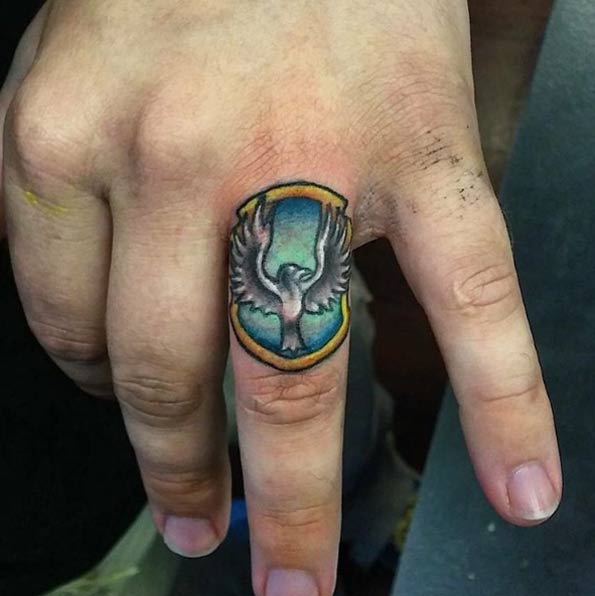 Nice Raven Claw Finger Tattoo