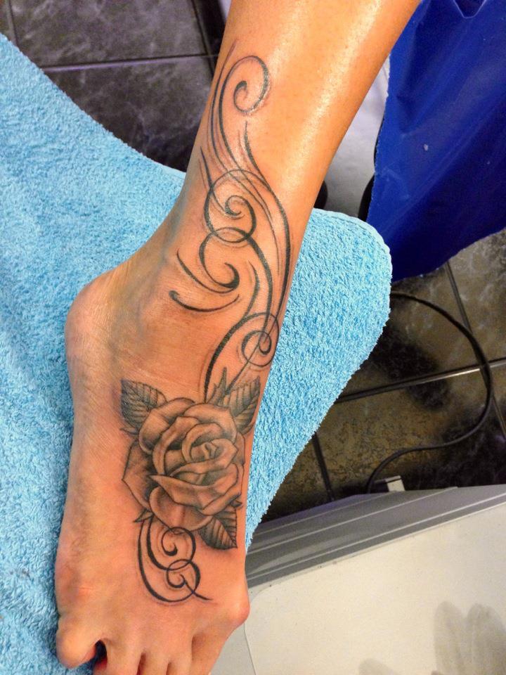 Nice Rose Swirls Tattoo On Foot