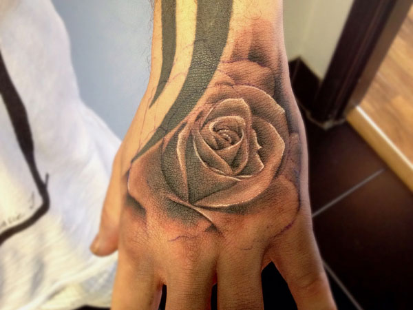 Nice Rose Tattoo On Hand For Men