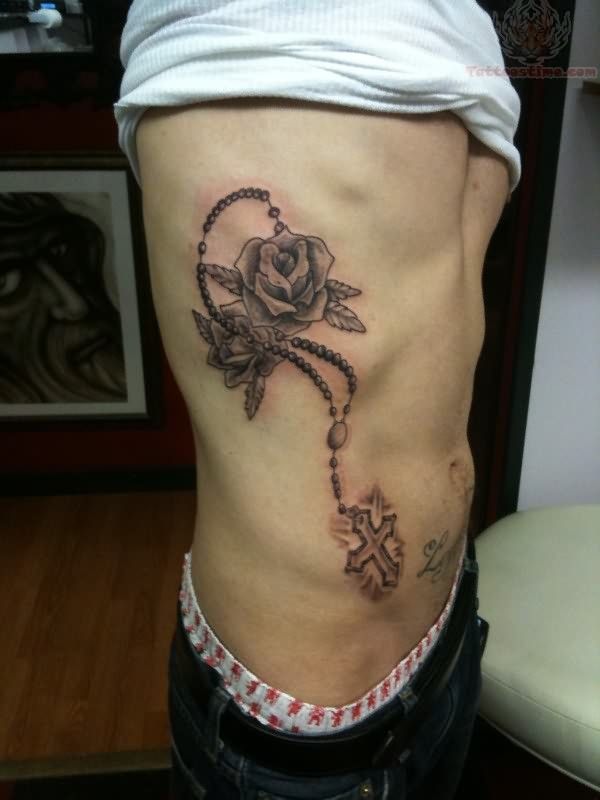 Nice Roses And Rosary Tattoo On Side Rib For Men