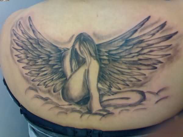 Nice Sitting Angel Tattoo On Upper Back For Women