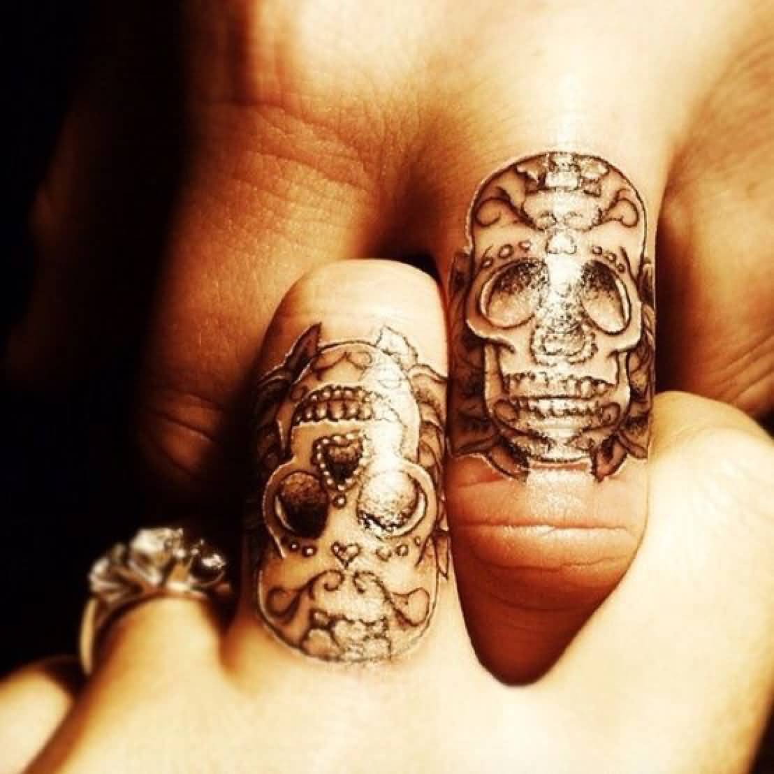 Nice Sugar Skull Matching Couple Tattoos Of Finger