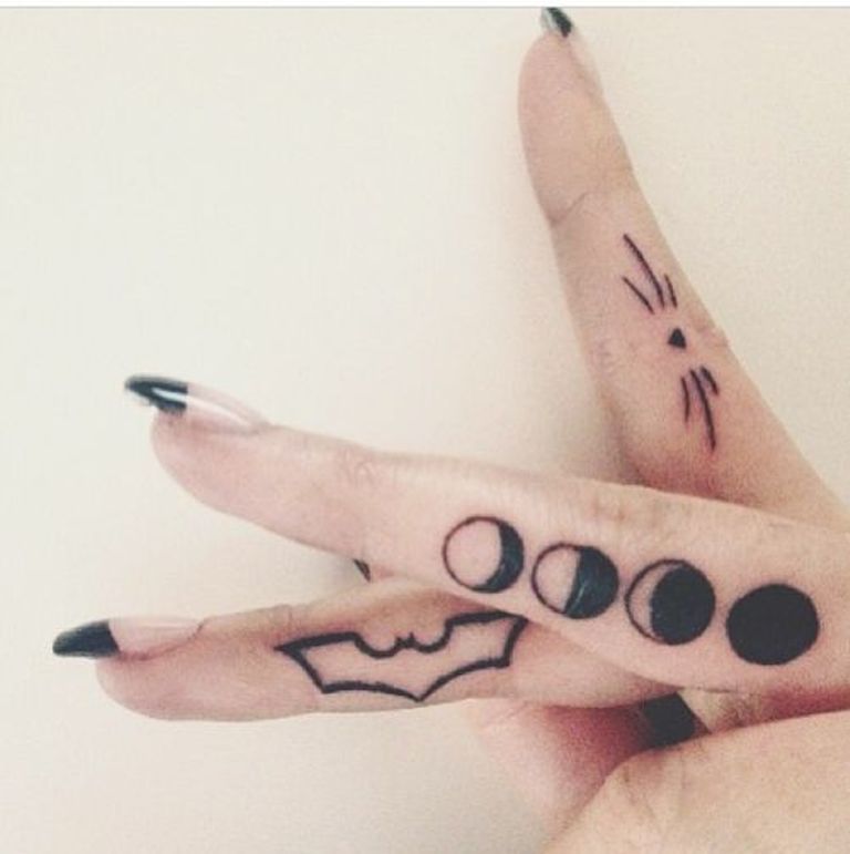 Nice Symbols Tattoo On Fingers For Girls