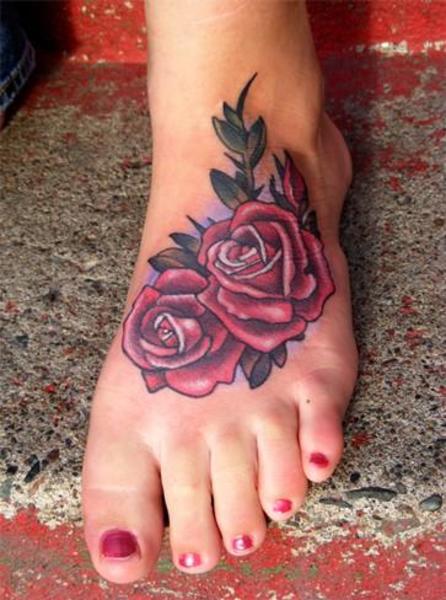 Nice Traditional Red Roses Foot Tattoo For Girls