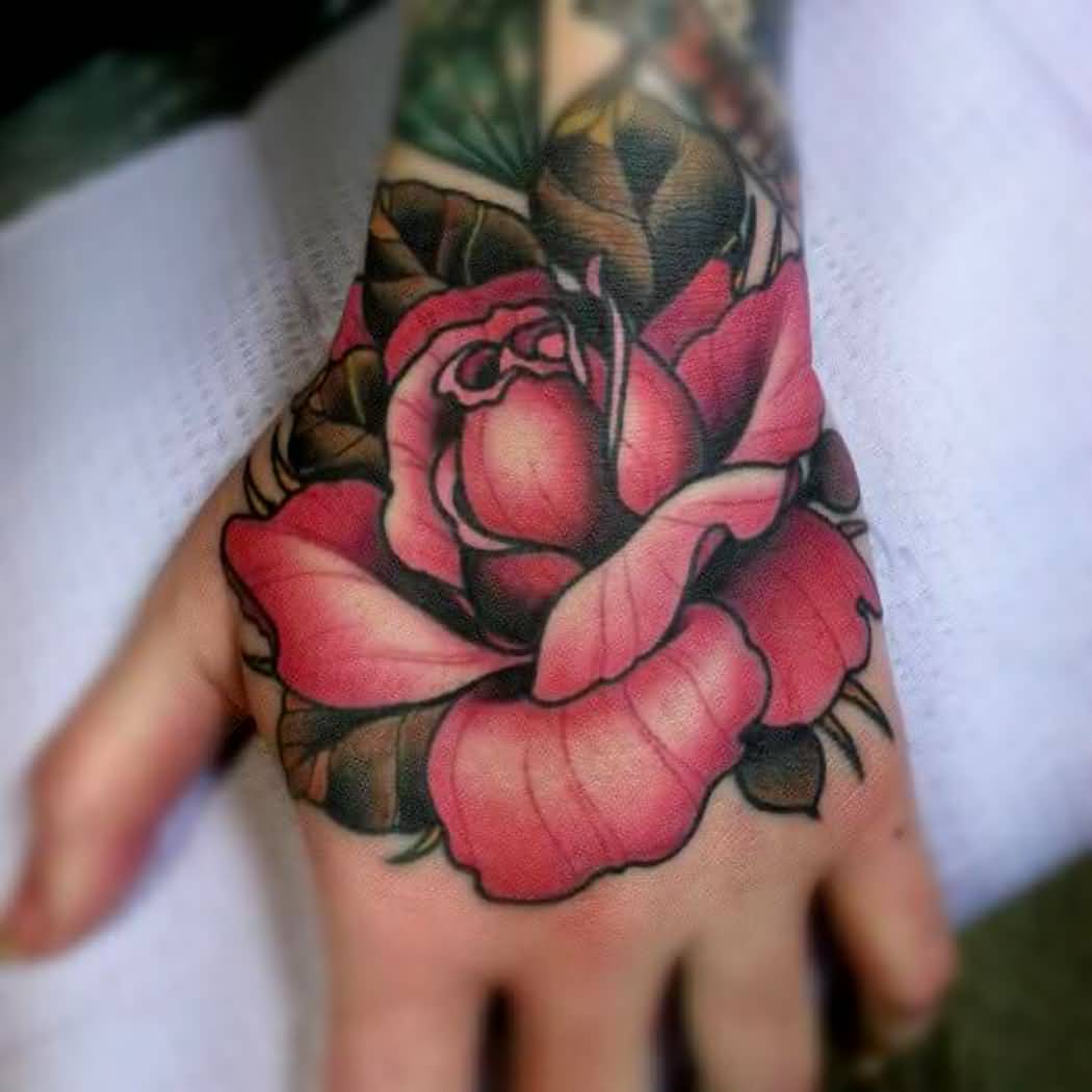 Nice Traditional Rose Tattoo On Hand For Men
