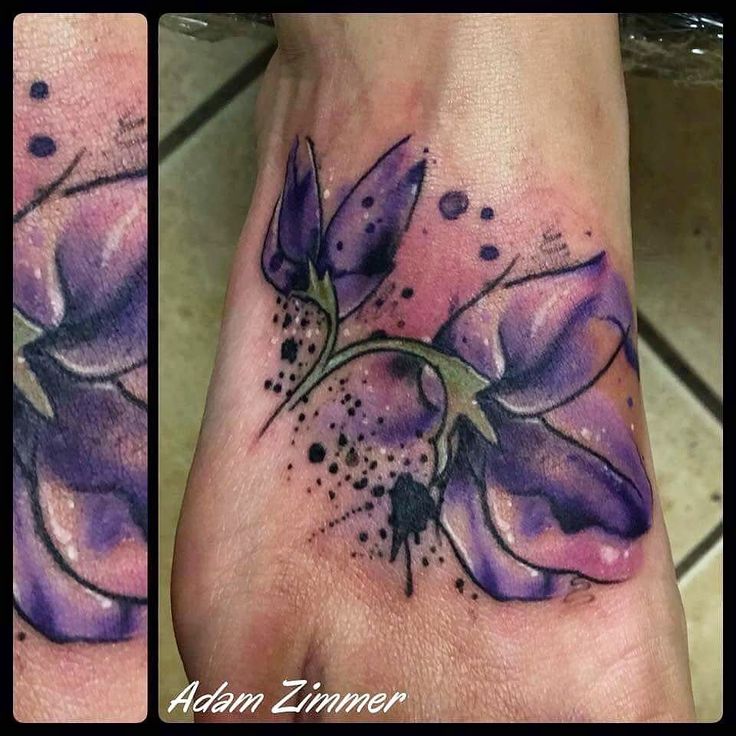 Nice Watercolor Purple Flower Tattoo On Foot