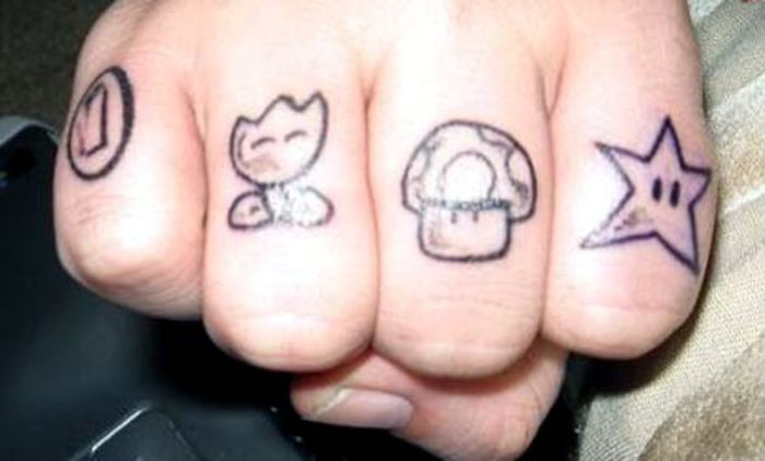 Nintendo Symbols On Knuckle Tattoo For Men