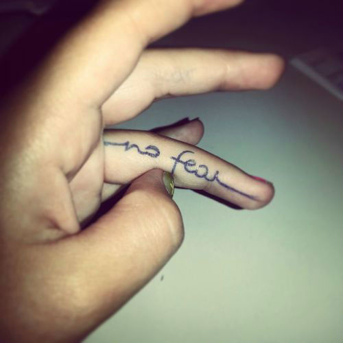 No Fear Inner Finger Tattoo