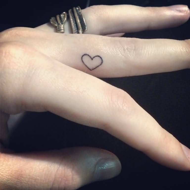 Outline Heart Tattoo On Side Finger