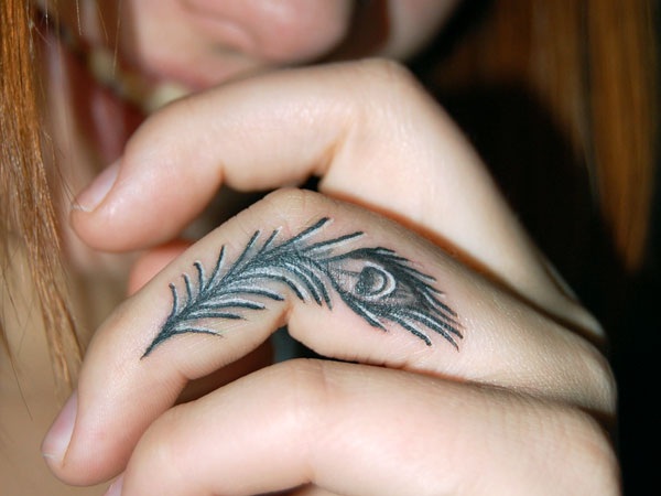Peacock Feather Tattoo On Girl Side Finger