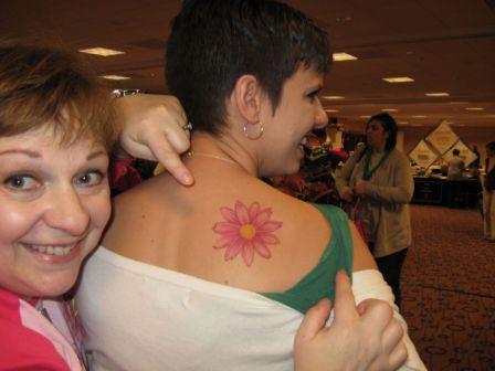 Pink Daisy Tattoo On Back Shoulder