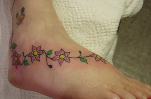Pink Floral Vine Tattoo On Foot