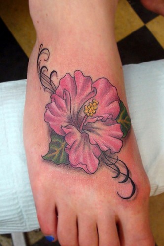 Pink Ink Hibiscus Flower Tattoo On Foot