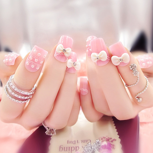 Pink Nails With Pearls And 3D Bow Design Nail Art