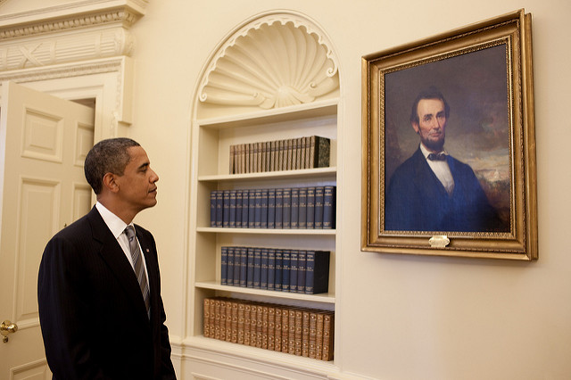 President Obama Looking On Abraham Lincoln's Portrait Inside The White House