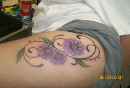 Purple Daisy Tattoos On Thigh