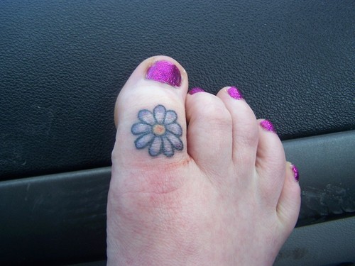 Purple Flower Tattoo On Foot For Girls