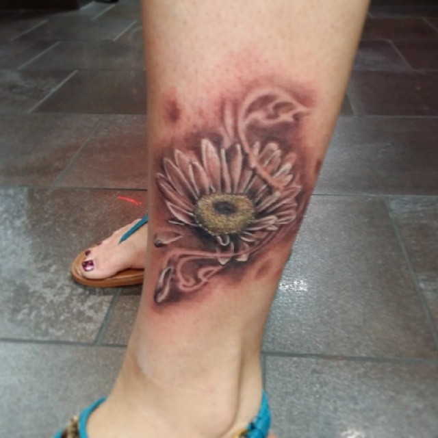 Realistic Daisy Flower Tattoo On Girl Left Ankle