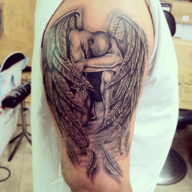 Realistic Fallen Angel Tattoo On Man Right Shoulder