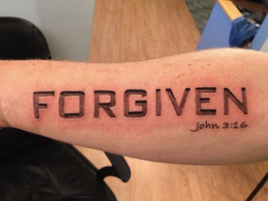 Realistic Forgiven Christian Tattoo On Forearm