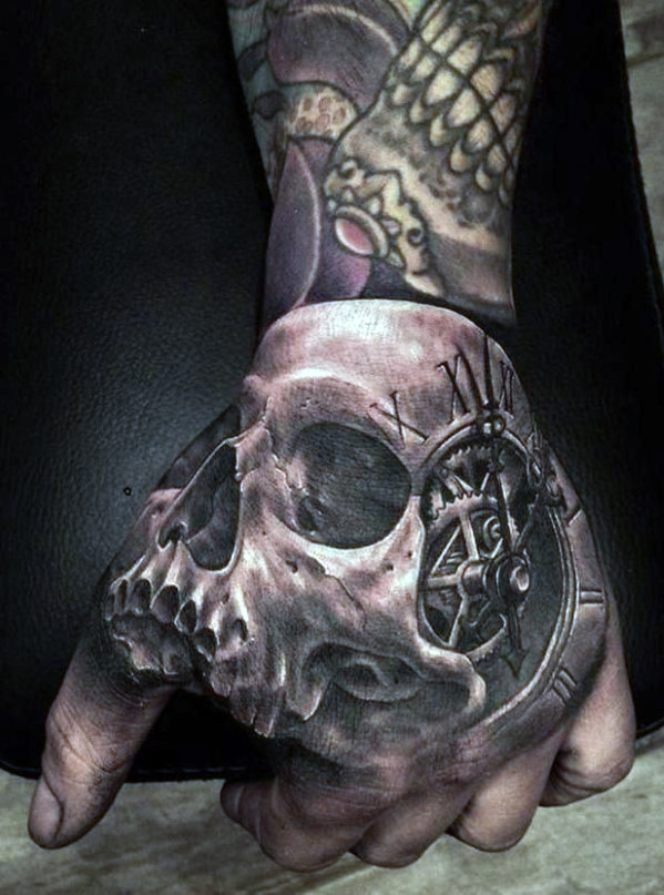 Realistic Time Skull Tattoo On Hand For Men